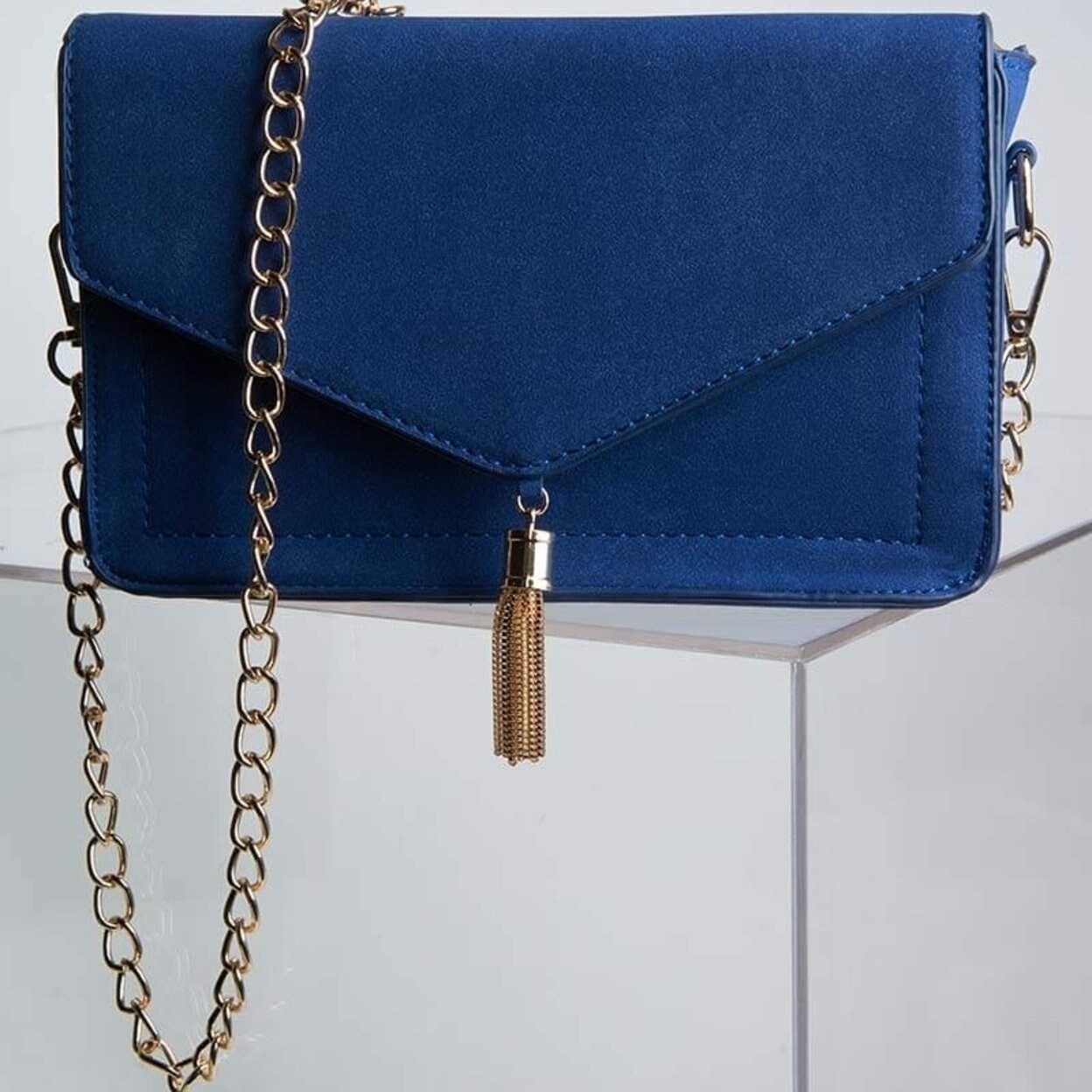 royal blue suede clutch bag