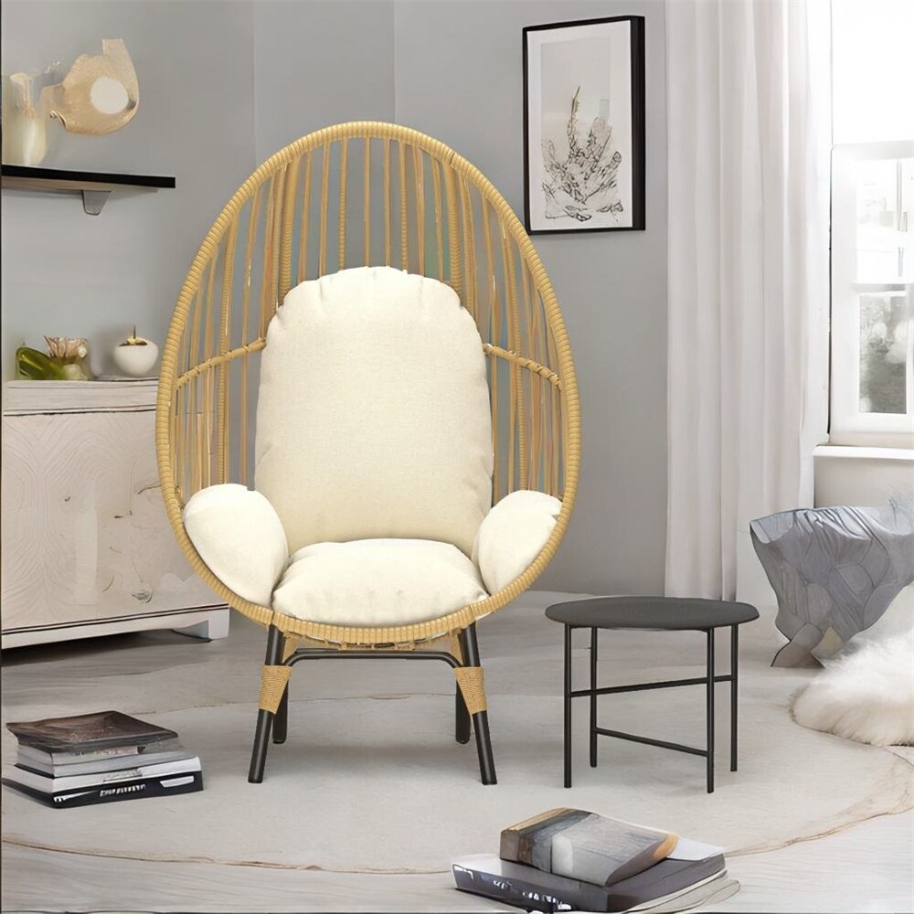 https://ak1.ostkcdn.com/images/products/is/images/direct/863fa786120e3802aa4883d11651cc9d729cd061/Rattan-Egg-Chair-with-Same-Color-Cushion-and-Black-Side-Table.jpg
