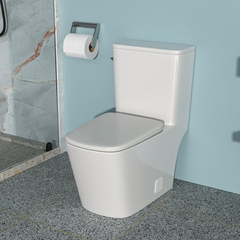 1-piece 1.28 GPF Single Flush Elongated Toilet in White Seat Included - 27" x 14" x 30"