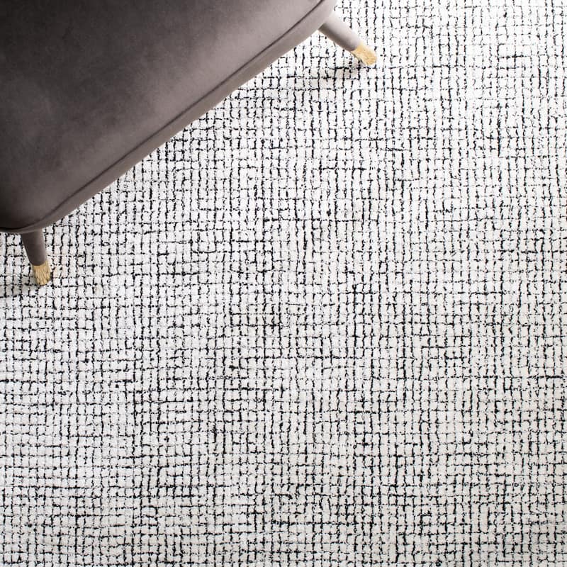 SAFAVIEH Handmade Abstract Marikka Modern Viscose Rug