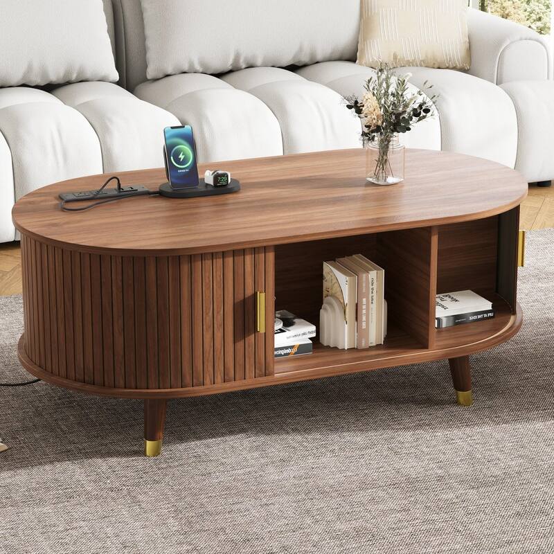 42.5" Mid-Century Oval Coffee Table – Solid Wood Fluted Design with Sliding Tambour Door & Built-In Charging Station.