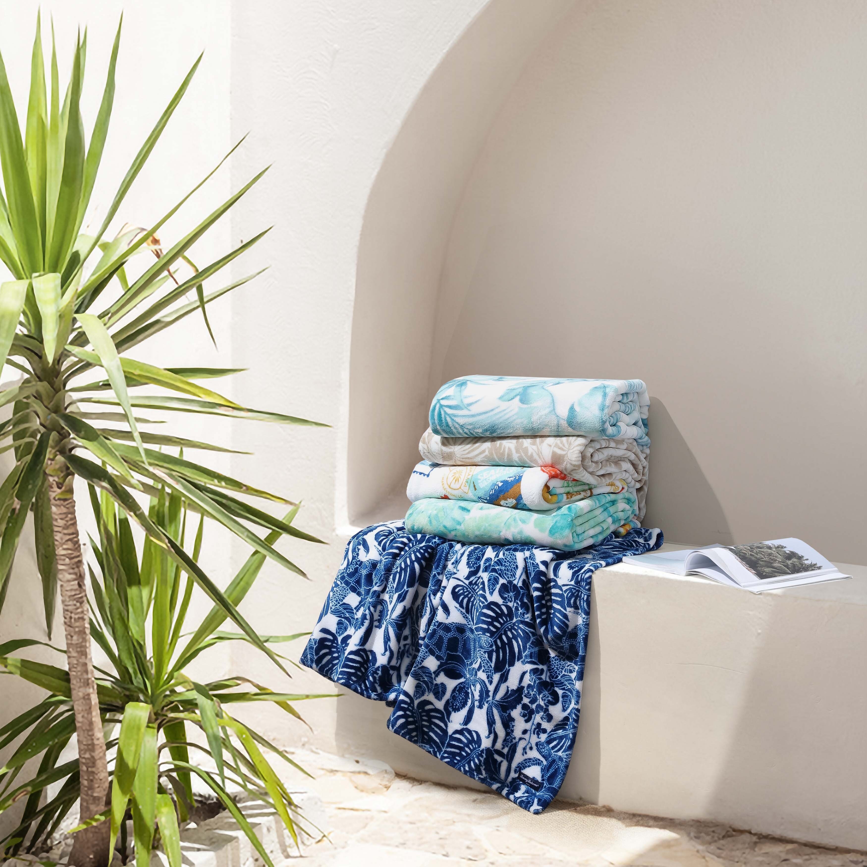Get Tommy Bahama's indulgently soft throw at a dreamy, limited