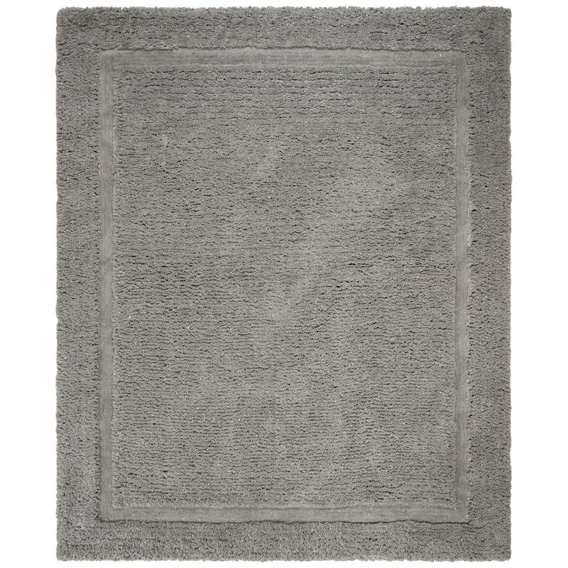 SAFAVIEH Handmade Glamour Shag Ammaria Casual Solid Polyester Rug