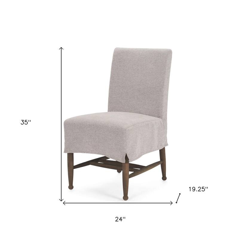 HomeRoots Gray and Brown Slipcovered Fabric and Wood Dining Side Chair - 24.00 in. x 35.00 in. x 19.25 in.