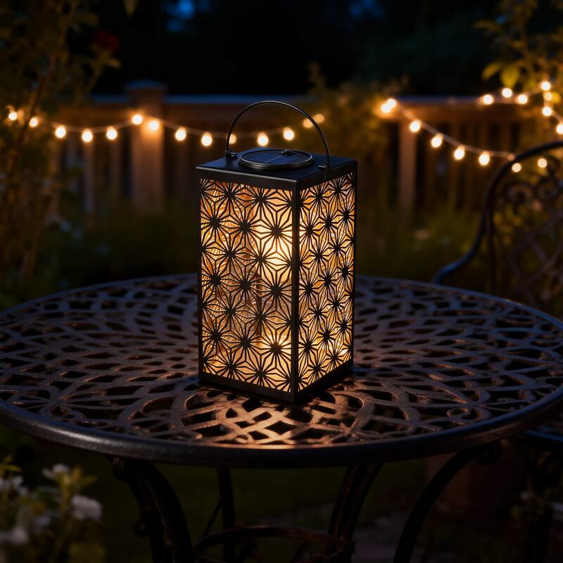 Glitzhome 11"H Black Metal Cutout or Square Textured Glass Pattern Solar Powered Hanging Lantern with LED Light - Single-Cutout Pattern