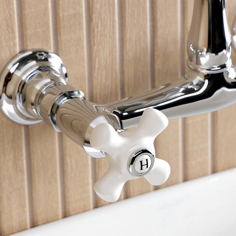 Kingston Brass English Country Two-Handle 2-Hole Wall Mount Bathroom Faucet