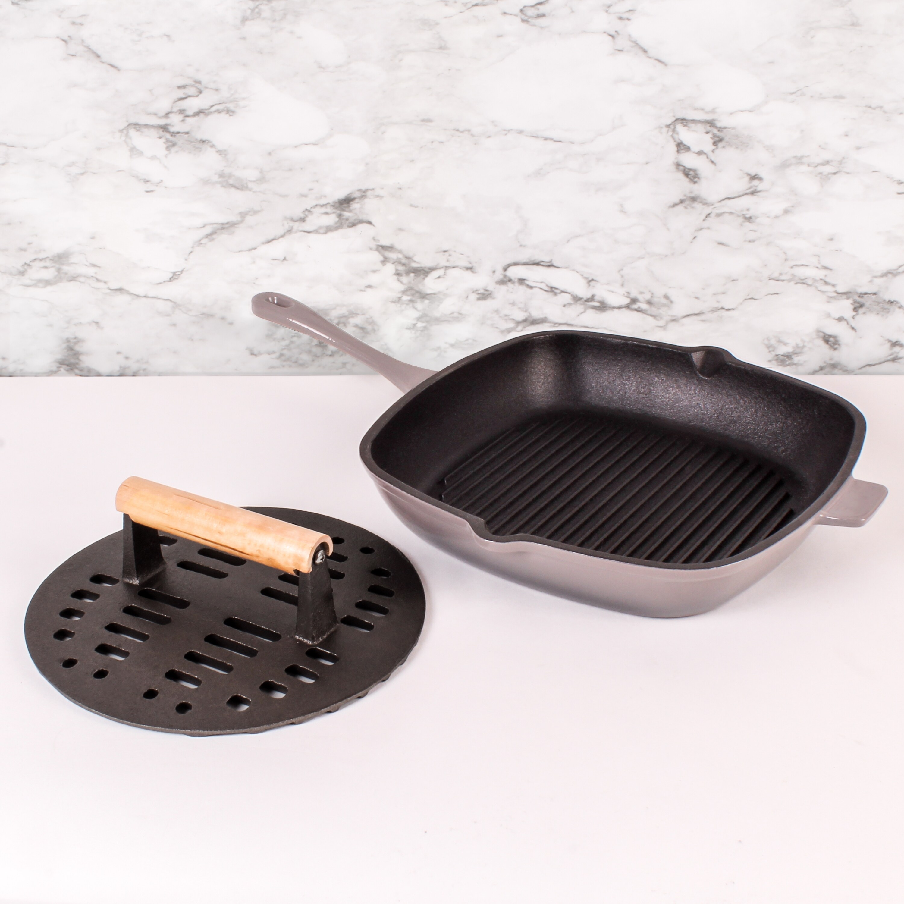 https://ak1.ostkcdn.com/images/products/is/images/direct/87a523cda1b2b62b388d2de7c02f88e5225c4826/Neo-2pc-Cast-Iron-Set-11%22-Grill-Pan-%26-with-Slotted-Steak-Press-Oyster.jpg