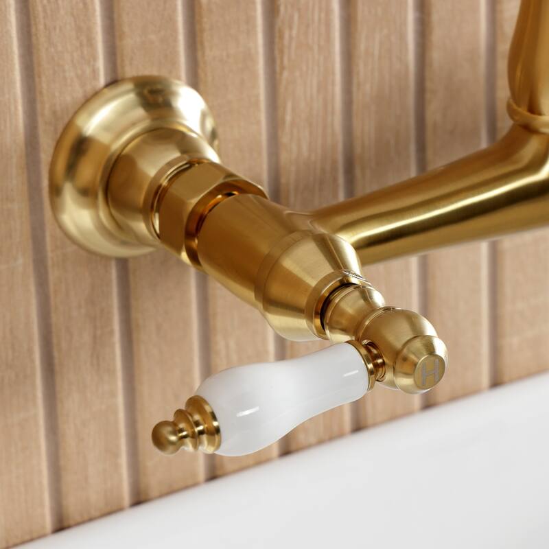 Kingston Brass English Country Two-Handle 2-Hole Wall Mount Bathroom Faucet