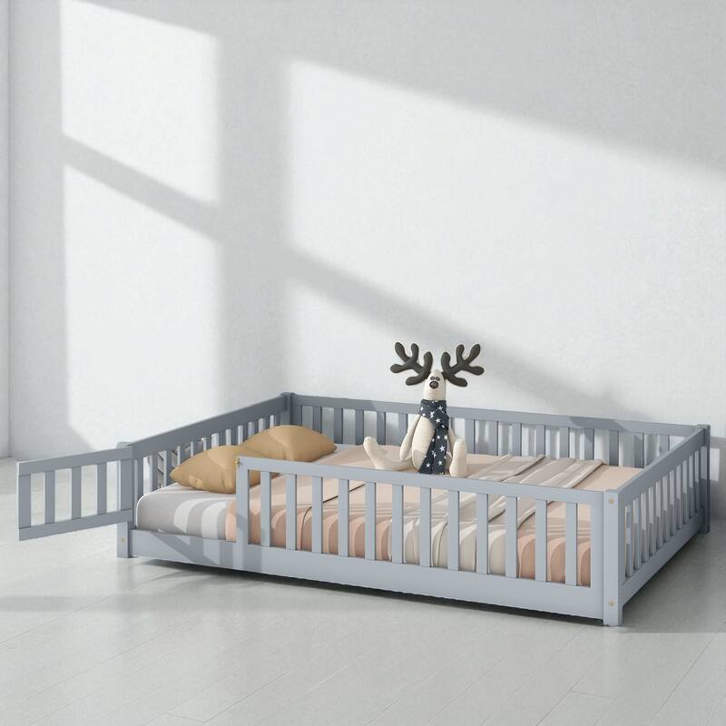 Full Size Rubber Wood Floor Bed with Fence, Door and Safety Guardrails for Kids