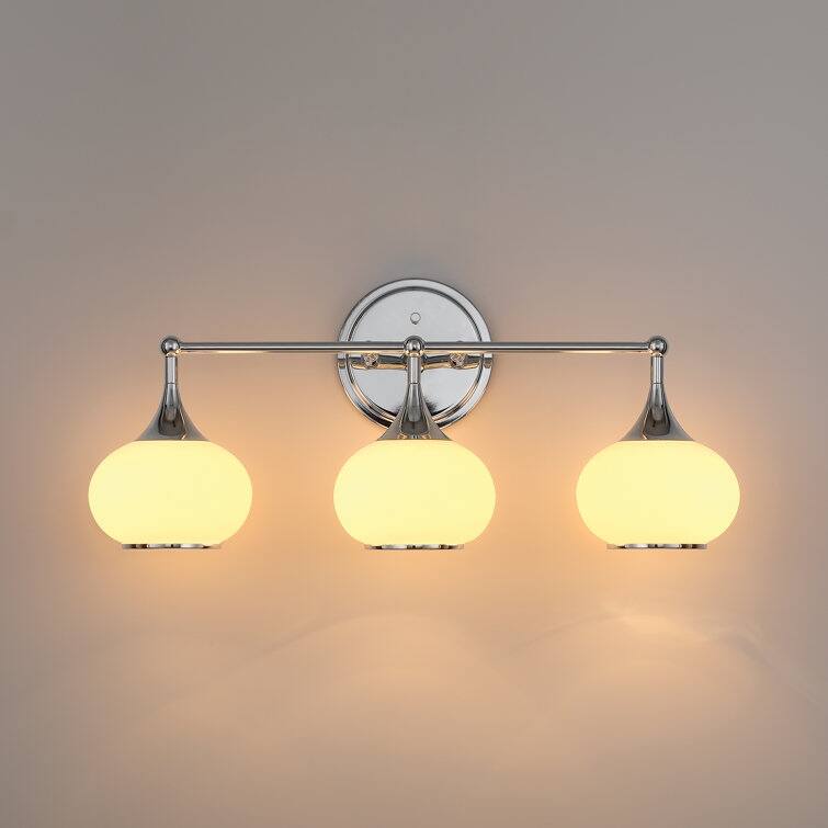 Acroma Aged Brass/Polished Chrome Finish Modern Globe Vanity Light