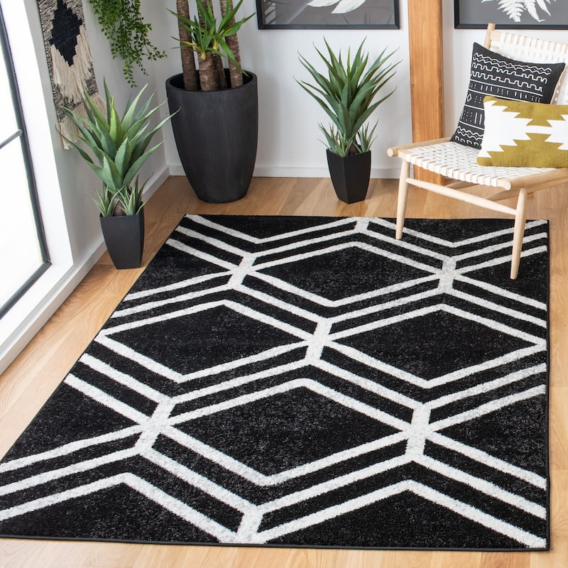 SAFAVIEH Adirondack Olsa Geometric Distressed Rug - 9' x 12' - Black/Ivory