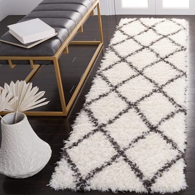SAFAVIEH Handmade Flokati Agni Shag Solid Polyester Rug