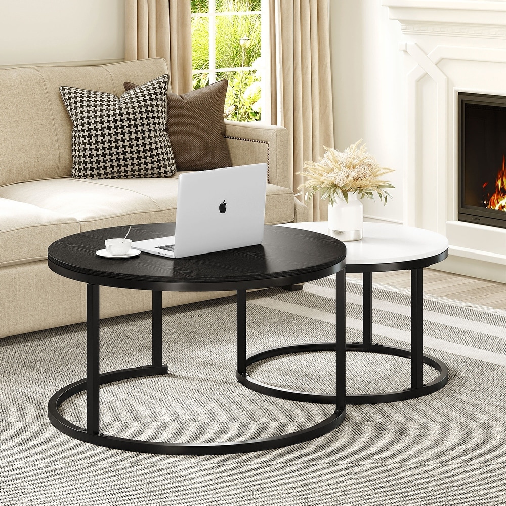 https://ak1.ostkcdn.com/images/products/is/images/direct/884a6833b902b86ea1e176db9b1916a7a1de4992/Modern-Nesting-Round-Coffee-Table-Set-of-2-for-Living-Room-Black-and-White.jpg