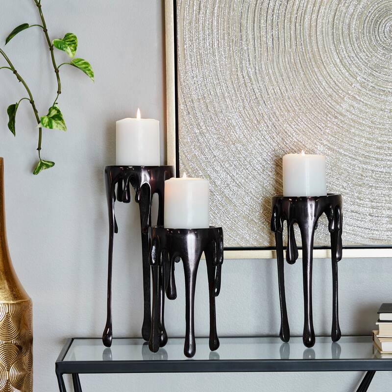 CosmoLiving by Cosmopolitan Silver, Gold or Black Aluminum Abstract Pillar Drip Candle Holder (Set of 3)