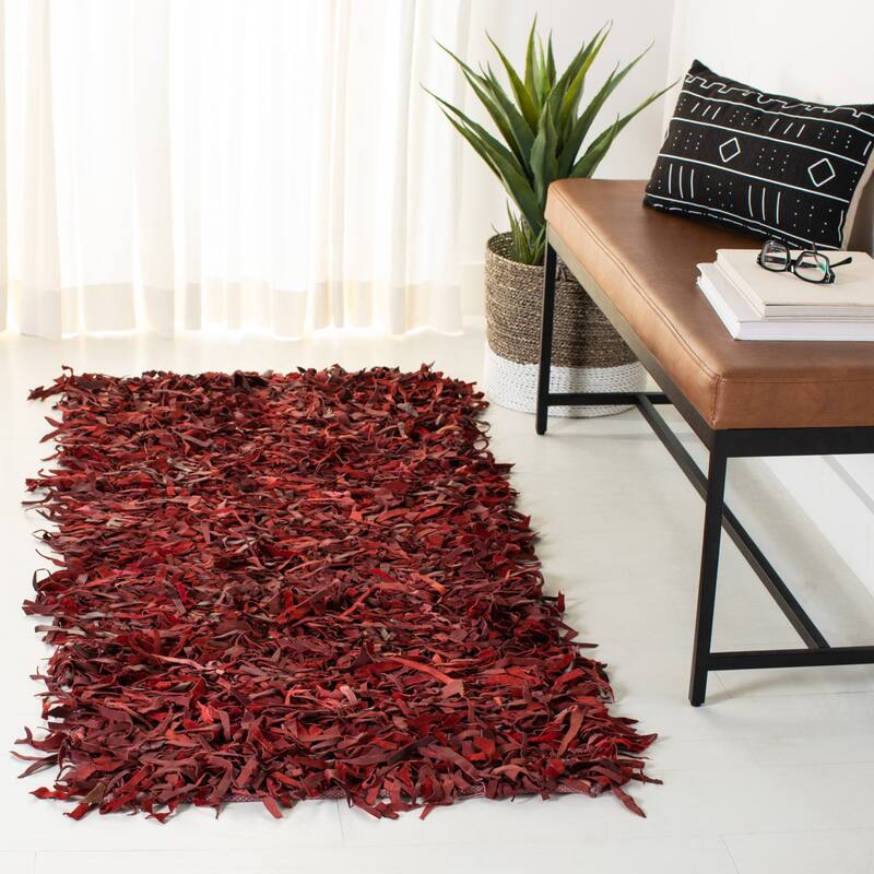 SAFAVIEH Handmade Leather Shag Carlijn Modern Decorative Rug - 2'3" x 6' Runner - Red