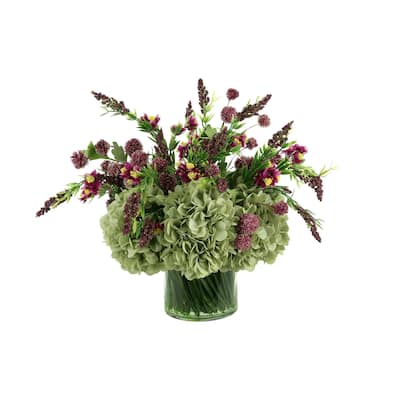 Hydrangeas and Heather Arranged in a Glass Vase with Grass
