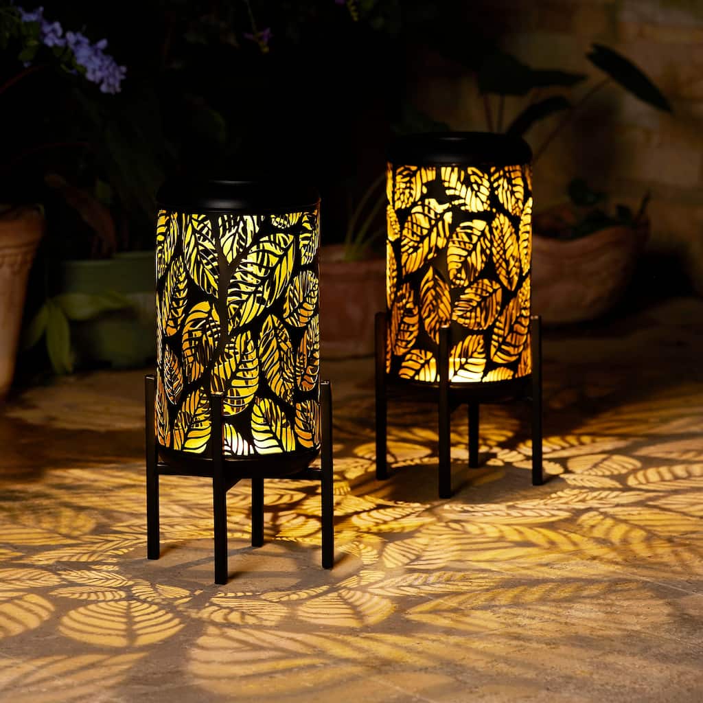 Glitzhome 14.25"H Set of 2 Metal Flower Cutout Solar Lanterns Floor Lantern