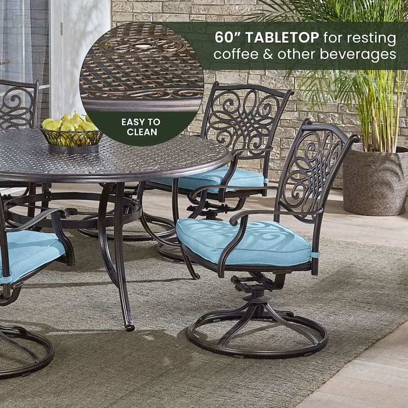 Hanover Traditions 7-Piece Dining Set in Blue with a 60 In. Round Cast-top Table and Six Swivel Rockers