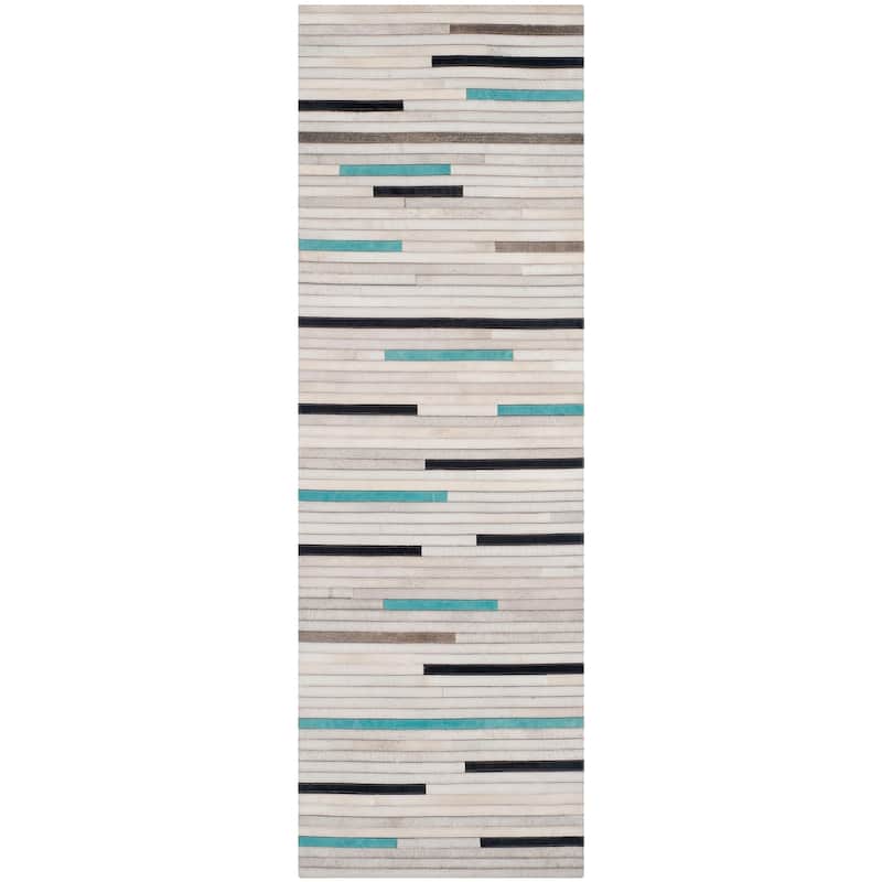 SAFAVIEH Handmade Studio Leather Borghild Modern Leather Rug