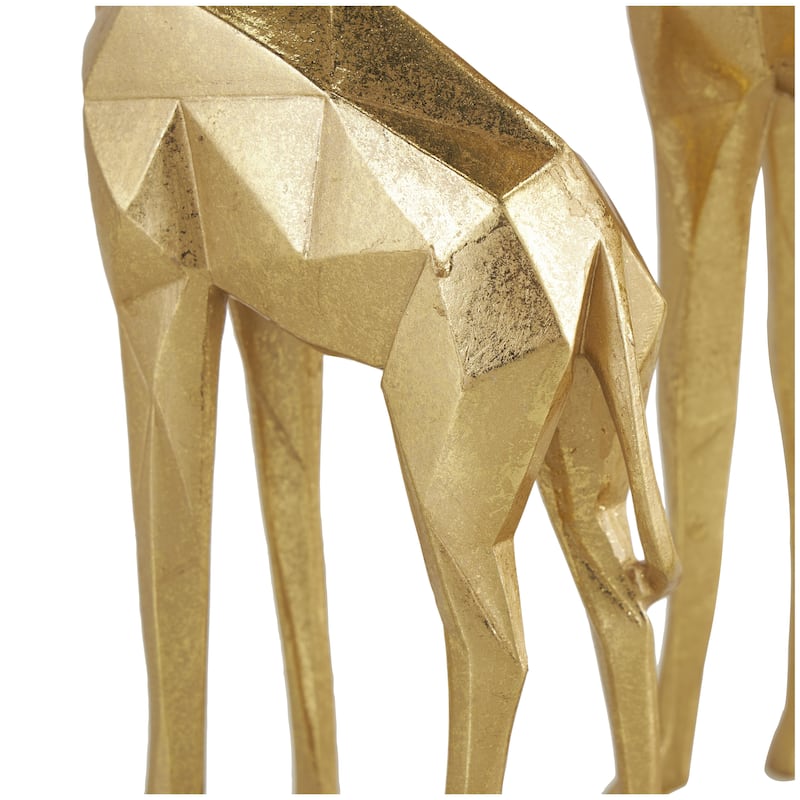 CosmoLiving by Cosmopolitan Gold or Silver Polystone Giraffe Decorative Sculpture (Set of 2)