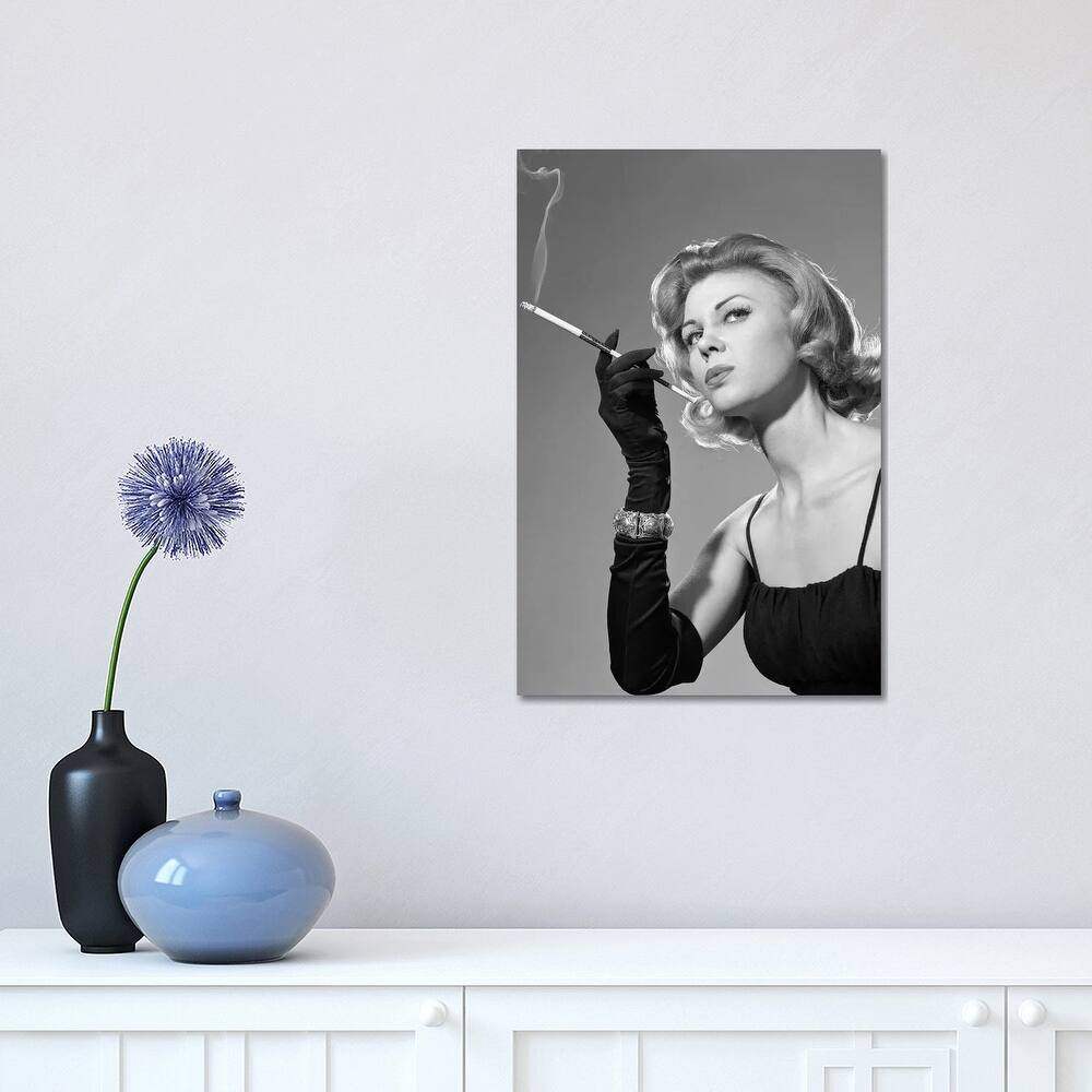 iCanvas "1960s, Woman With Long Black Gloves Smoking A Cigarette In A Long Cigarette Holder" by Vintage Images Canvas Print