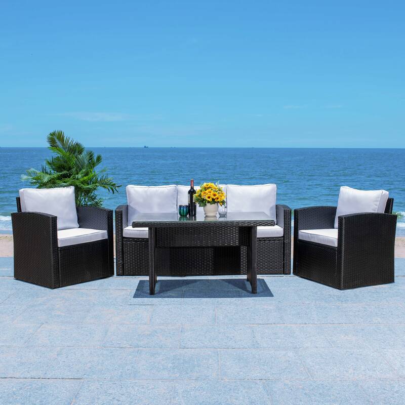 SAFAVIEH Outdoor Living Nyra 4-Piece Patio Dining Set - 70"W x 32"D x 27"H - Black/White Cushion