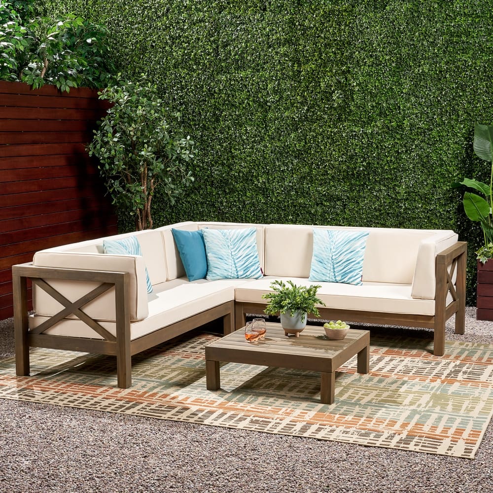 Brava Outdoor 4 Piece V-Shaped Acacia Wood Sectional Sofa and Coffee Table Set by Christopher Knight Home