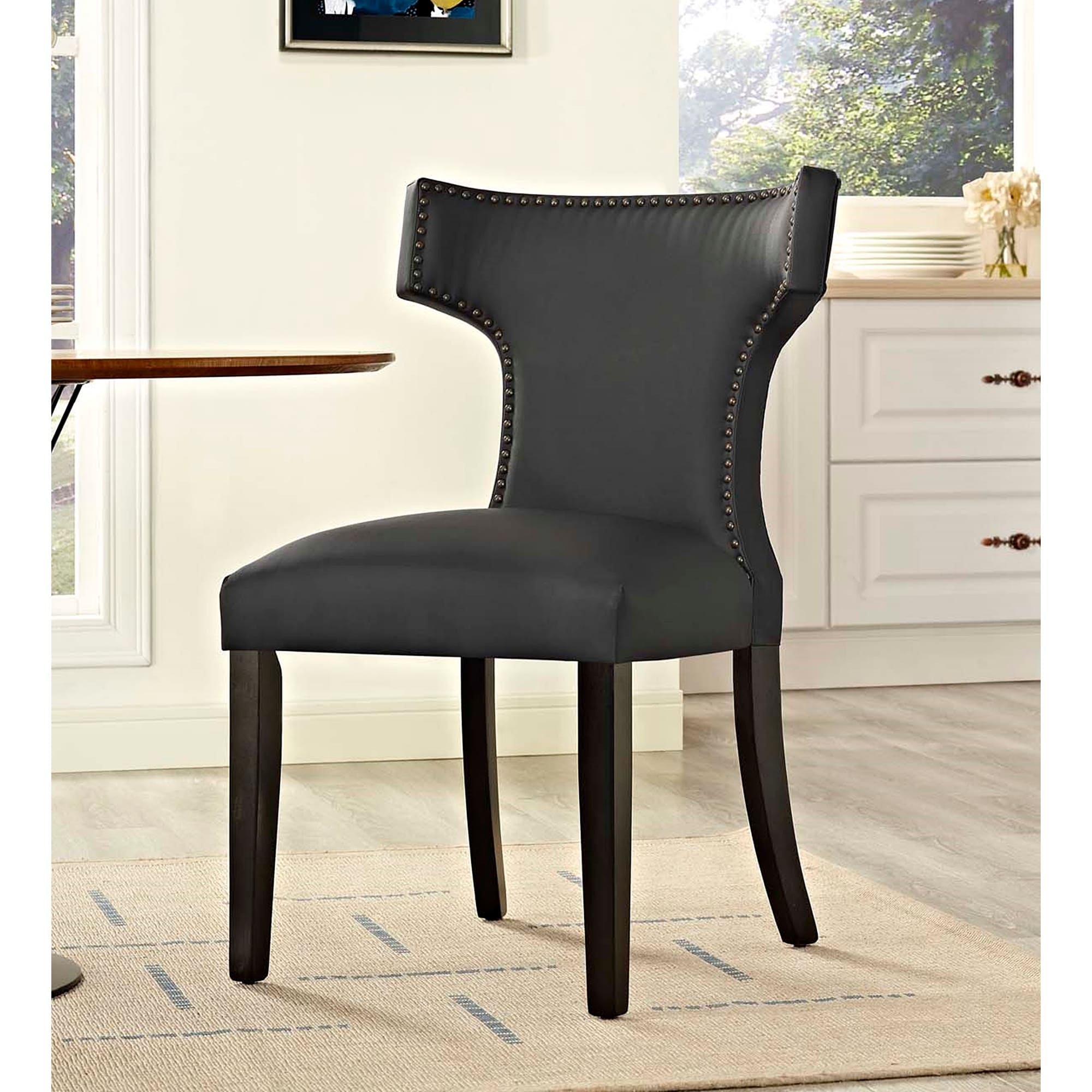 Black curved sales dining chair