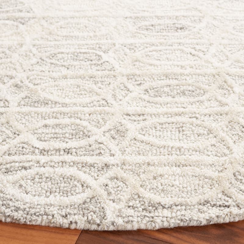 SAFAVIEH Handmade Ebony Giseltraud Modern Wool Rug