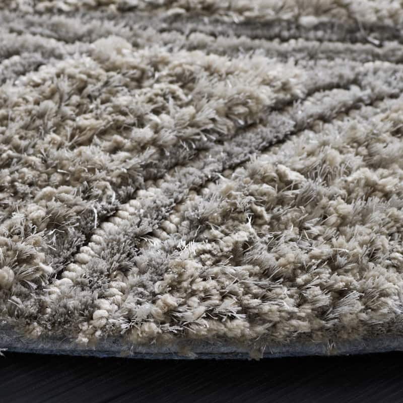 SAFAVIEH Handmade South Beach Daisha Shag Solid Polyester Rug