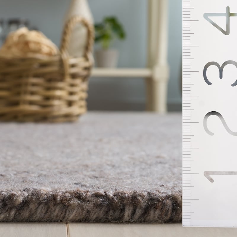 SAFAVIEH Handmade Renewal Sirle Rug