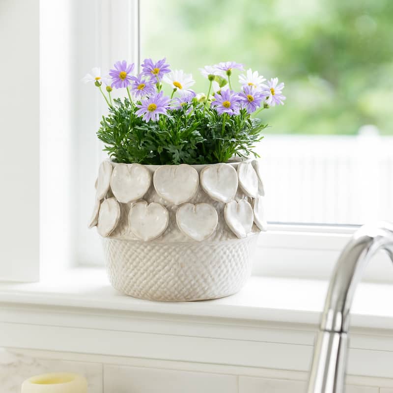 Stylish Ceramic Planter with Sculptural Leaf Heart Details