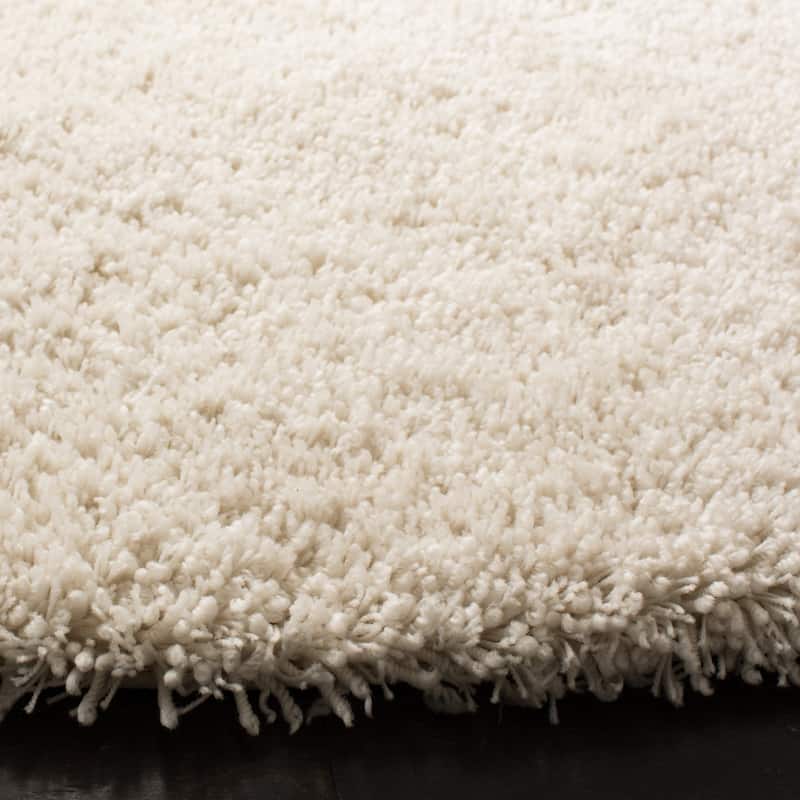 SAFAVIEH Handmade Classic Shag Nakhshun Rug