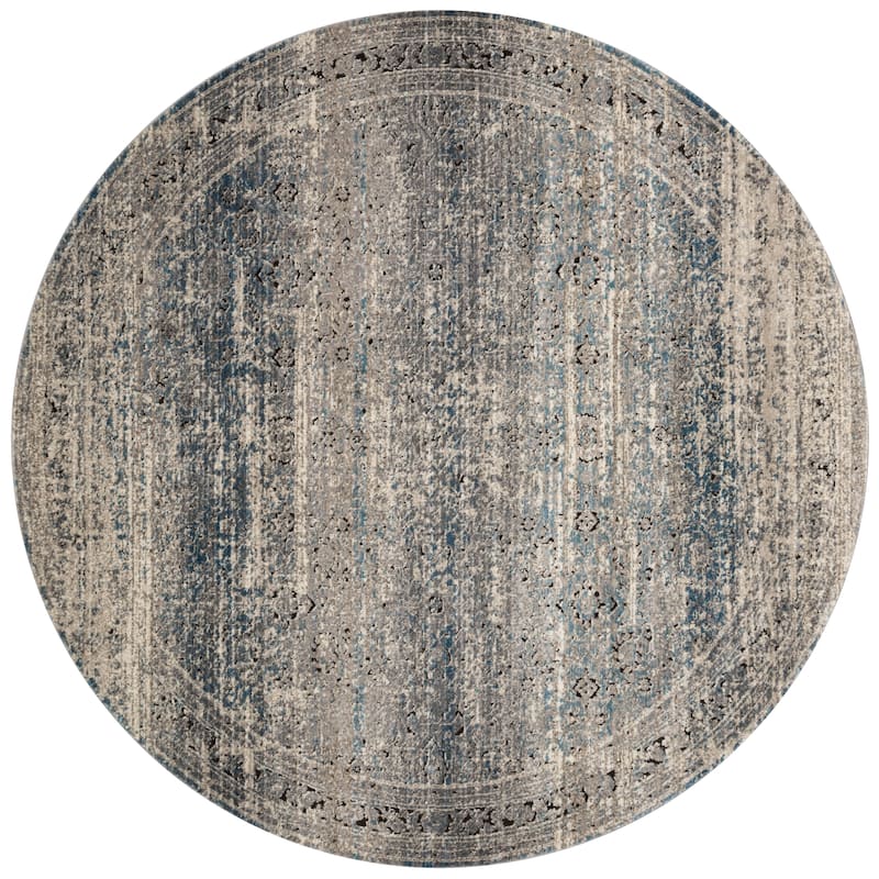 Alexander Home Carissa Distressed Floral Border Area Rug