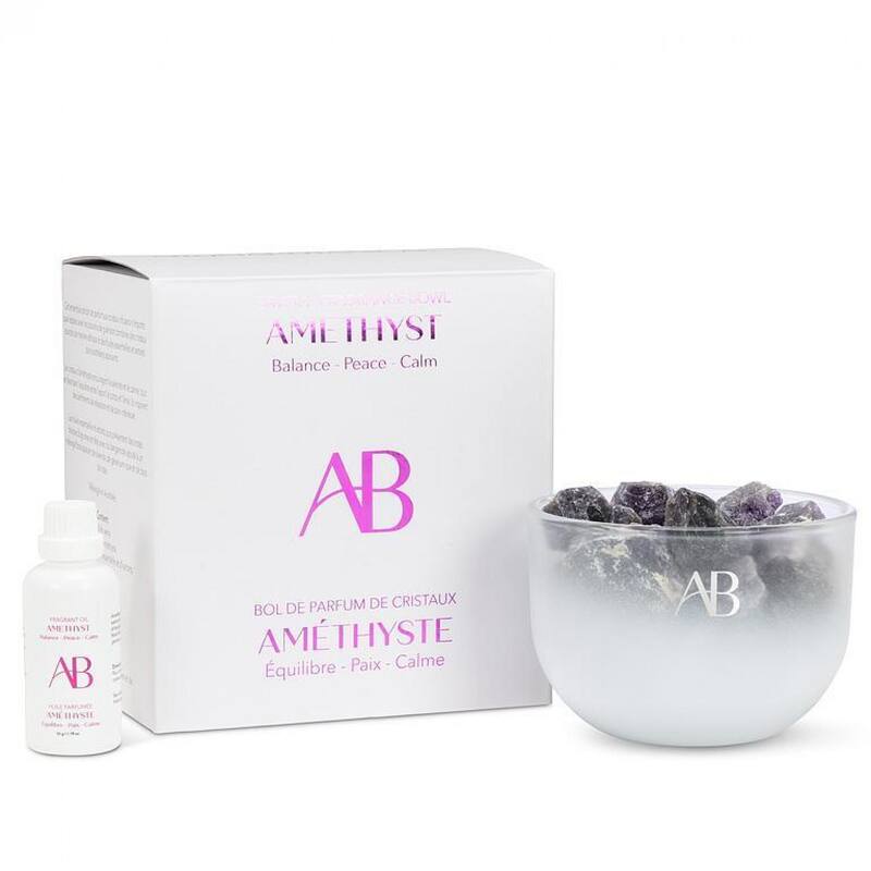 Amethyst Crystals In A Bowl With Essential Oil