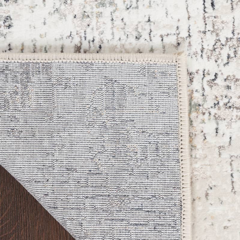 Nourison Distinctive Indoor only Cream / Ivory Abstract Area Rug - 7' 10" x 9' 10"