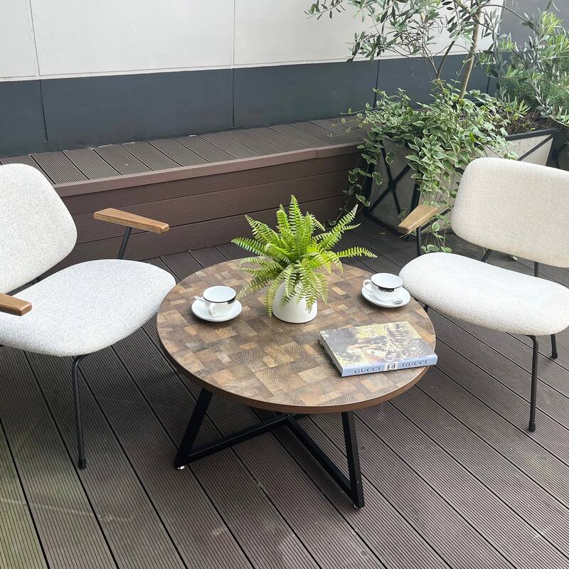 Round Coffee Table with Wood Grain and Black Metal, a Stylish and Functional Centerpiece for Your Living Space.
