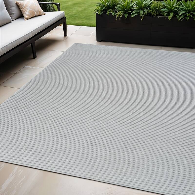 Tasi Stripe Weather Resistant Current & Stylish Outdoor Rug