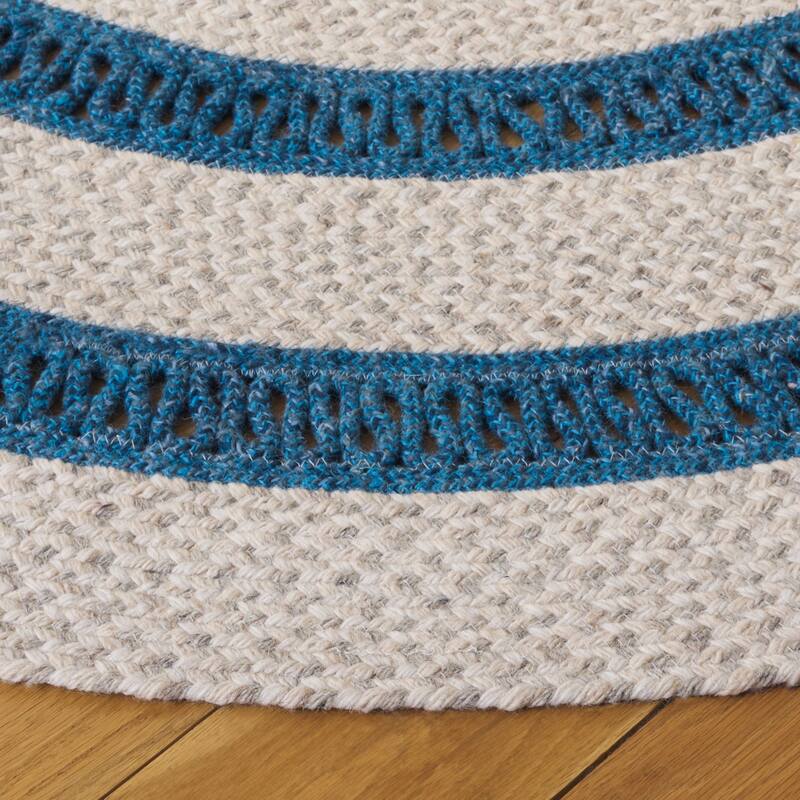 SAFAVIEH Handmade Braided Neshama Wool Rug