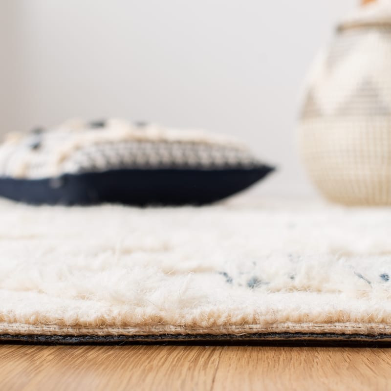 SAFAVIEH Handmade Casablanca Shag Flores Wool Rug
