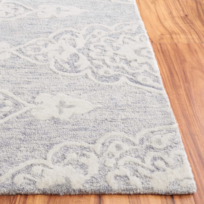 SAFAVIEH Handmade Ebony Ysaline Modern Wool Rug