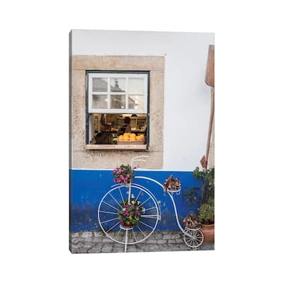 iCanvas "Portugal, Obidos. Cute bicycle planter in front of a bakery in the walled city of Obidos." by Julie Eggers Canvas Print