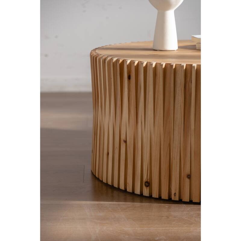 Cylindrical Coffee Table with Vertical Texture Relief Design