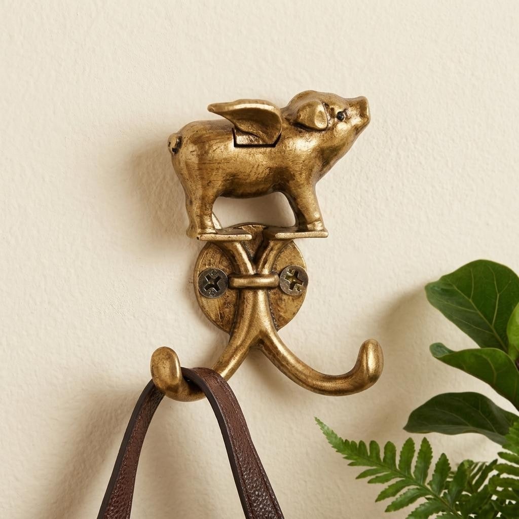 HomeRoots Two Hook 2" Antiqued Gold Cast Iron Pig Wall Hooks - 2.38 in. x 3.00 in. x 0.50 in.
