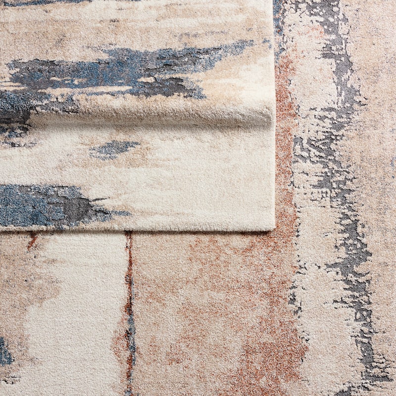 Evander Abstract Tan/ Blue Area Rug