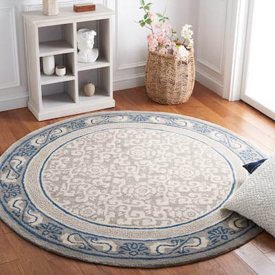 SAFAVIEH Handmade Antiquity Lauresha Wool Rug