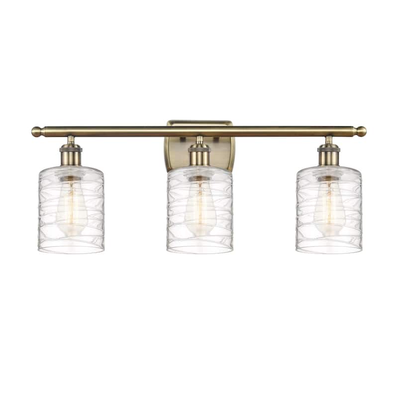 Innovations Lighting 516-3W-10-26 Cobbleskill Vanity Cobbleskill 3 - Antique Brass / Deco Swirl