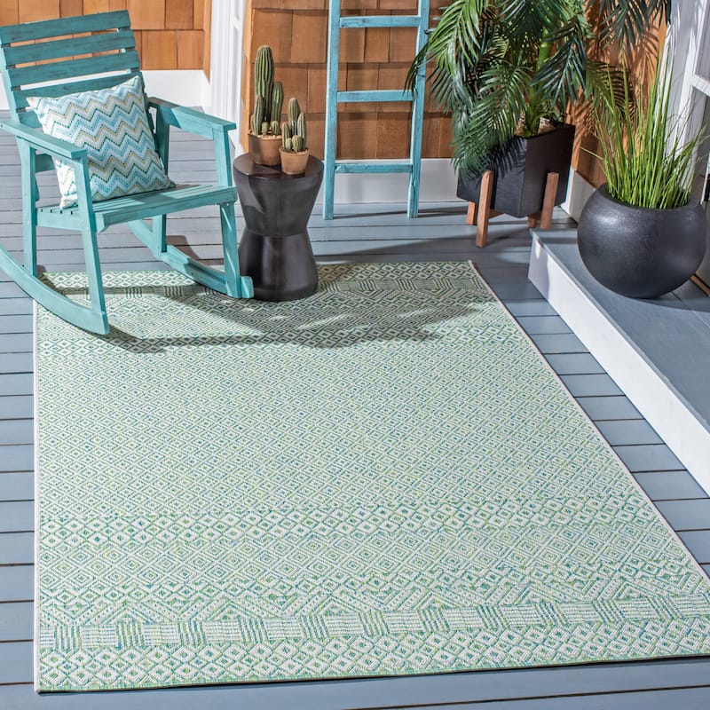SAFAVIEH Courtyard Terezija Indoor/ Outdoor Waterproof Patio Backyard Rug - 6'7" x 9'6" - Ivory/Green
