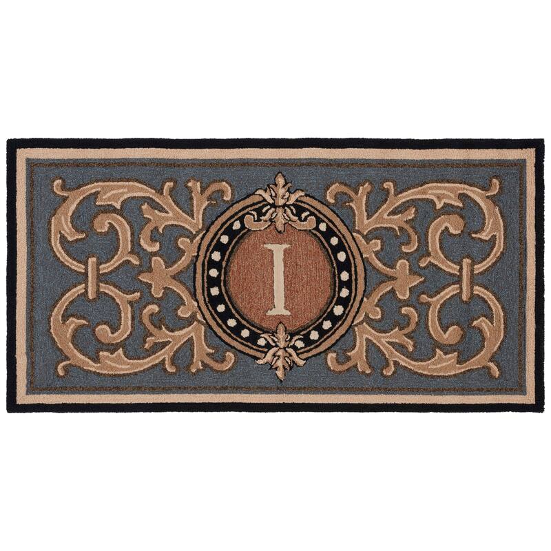 SAFAVIEH Handmade Monogram Irmengard Casual Rug