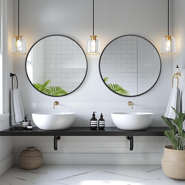 Two round mirrors on wall on sale